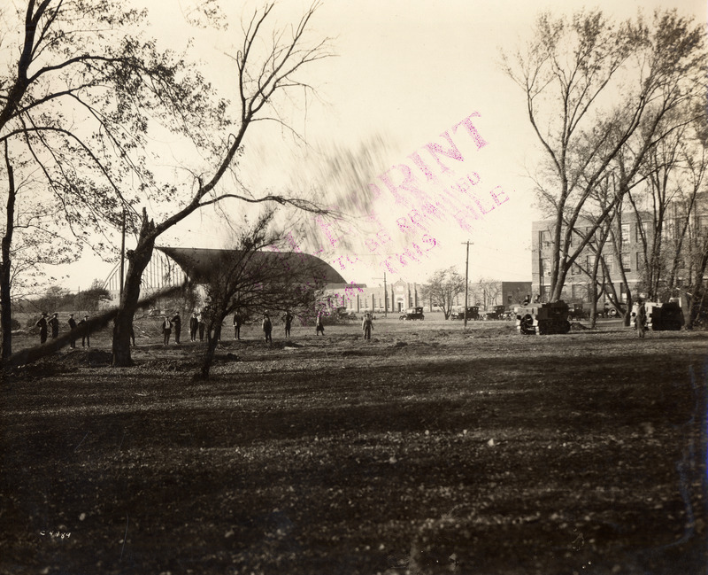With funding secured in 1919, it wouldn’t be until 1922 that real movement started on a new fireproof
library building. In September of that year, the Board approved architectural plans by Proudfoot, Bird,
and Rawson, and the next month, the ground was cleared, and excavation started for the foundation.
The following spring, the foundation was poured, and the ironwork for the superstructure began going
up. On October 11, 1923, an informal ceremony was held for the laying of the cornerstone of the
building. Classes were dismissed at 11:30, followed by short speeches by a number of dignitaries, and a
time capsule was placed in the cornerstone.