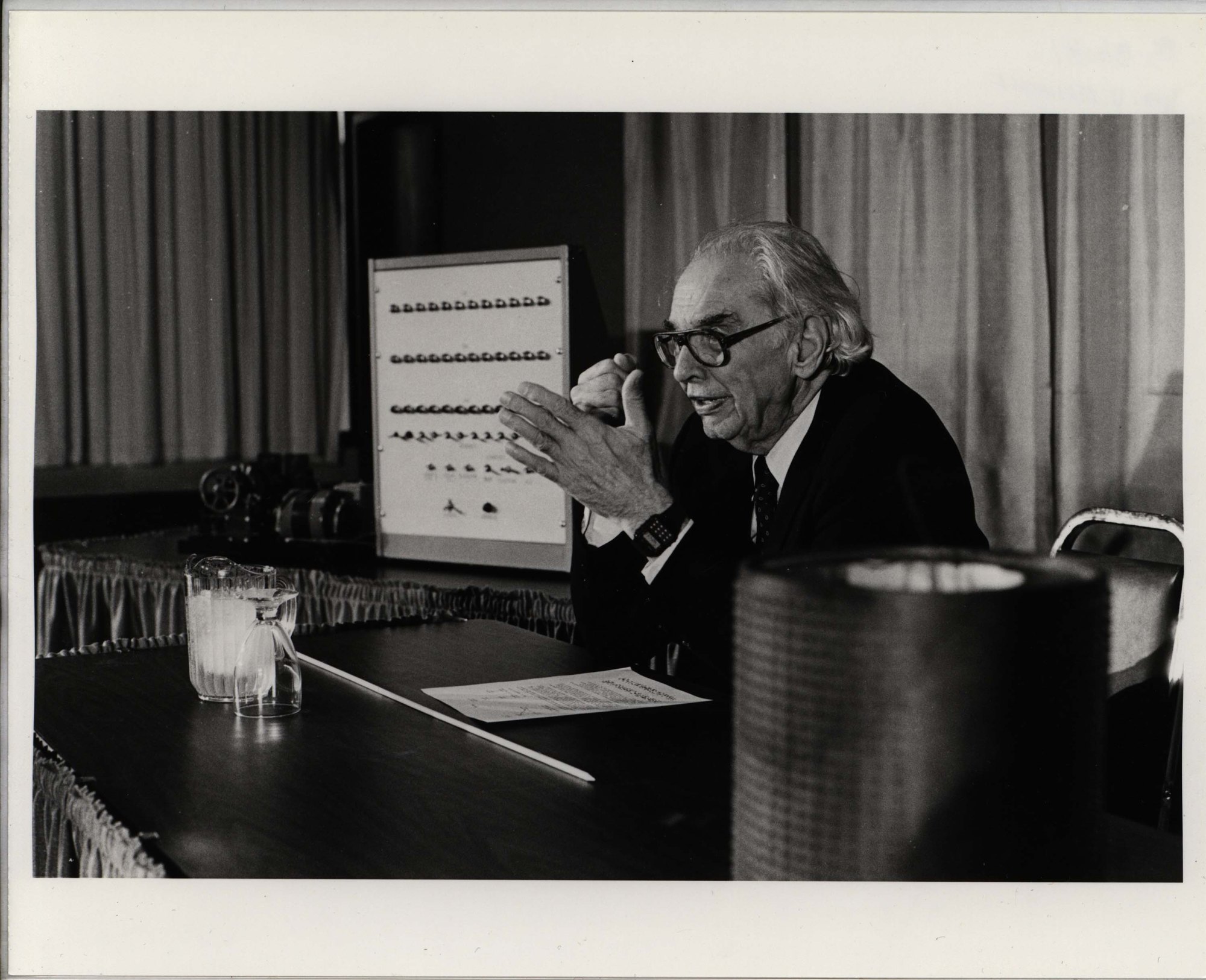 Black and white image of John Atanasoff giving a lecture