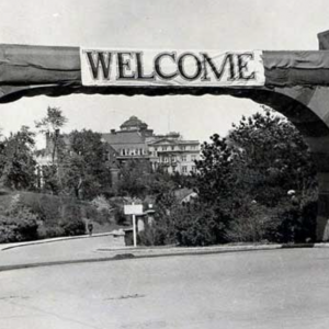Black and white photo of welcome gate